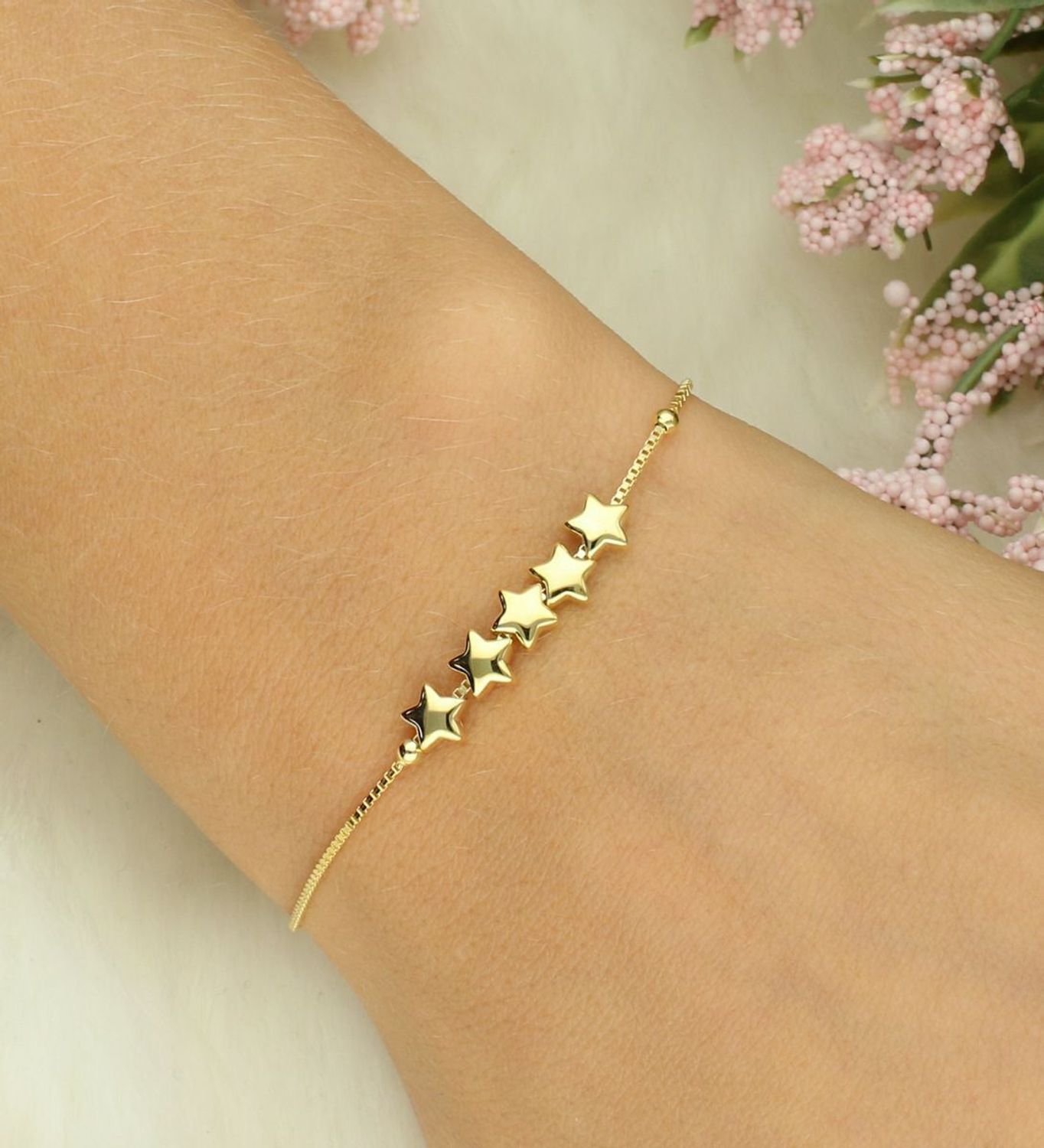 Bransoletka damska srebrna pozłacana z gwiazdkami Armonica Nomination 241303 009 .png